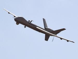 A US-made Reaper drone flies over Nigerien military airport Diori Hamani in Niamey in January 2015. [AFP/Getty/Dominique Faget]