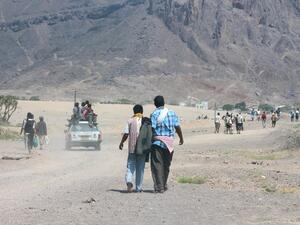 Soldiers flee Ras Abbas after a suicide bombing killed at least 14. (AFP/Saleh Al-Obeidi)