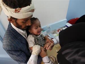 A Yemeni child suspected of being infected with cholera receives treatment at a hospital in Sana'a on May 6, 2017. (AFP)