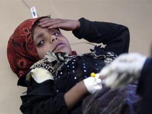 A Yemeni child, suspected of being infected with cholera, receives treatment at a hospital in the capital Sana'a on May 15, 2017. (AFP)
