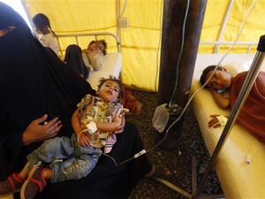 Yemeni children suspected of being infected with cholera receive treatment at a makeshift hospital in Sana'a on June 5, 2017. (AFP)