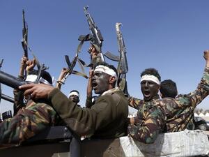 Houthi fighters chant slogans as they ride through Yemen's capital Sanaa. (AFP/file photo)