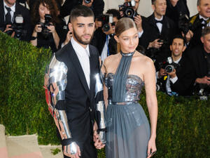 The 25-year-old singer stepped out shirtless in the Florida sunshine, it was hard to miss that he was still sporting the inking of his supermodel ex's eyes on his heavily tattooed chest(Source: Sky Cinema - Shutterstock)