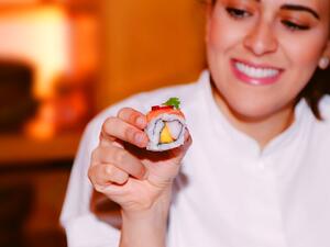Khulood Olaqi is hands on at the restaurant she owns, manages and even works preparing food in the kitchen. (AN photos by Basheer Saleh)