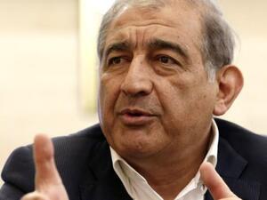 Syria's deputy PM Qadri Jamil was fired from office Tuesday for meeting with US representatives this past weekend to discuss the proposed Geneva peace talks to end the conflict in Syria (AP)