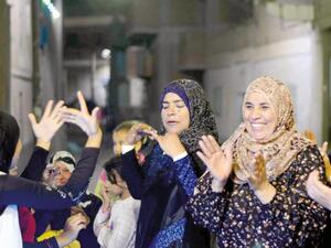 Although Egyptian women play great roles on social occasions as weddings, they are increasing turning their hands to political life  (AFP/File Photo)	