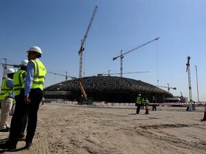 Abu Dhabi's effective policy response to low oil prices and economic growth were key drivers of Moody's outlook change. (AFP/ Marwan Naamani)