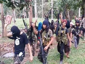 Abu Sayyaf militants. (Screenshot) Abu Sayyaf militants. (Screenshot)
