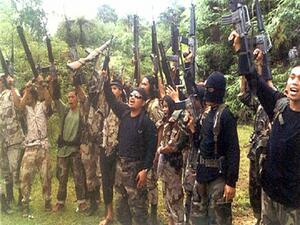 Daesh-linked Abu Sayyaf militants in the Philippines. (AFP/File) Daesh-linked Abu Sayyaf militants in the Philippines. (AFP/File)