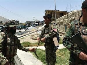 Afghan National Army soldiers stand alert at the site of a bomb blast that targeted NATO forces in Kabul on July 7, 2015. (AFP/File)