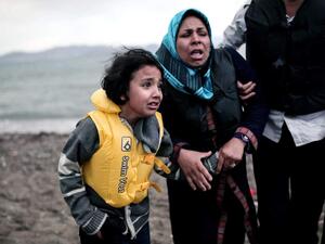 A group of Afghan refugees arrive on the Greek island of Kos, May 27, 2015.  (AFP/Angelos Tzortzinis)
