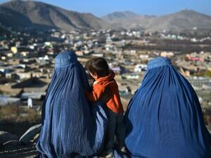 Afghan women overlook their town. (AFP/File)