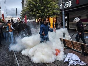 Demonstrators clash with riot police in Turkey's capital, Istanbul. (AFP)