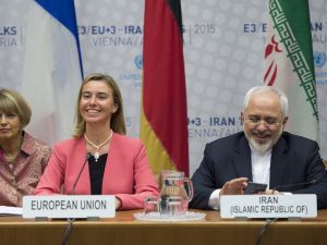 Iranian Foreign Minister Mohammad Javad Zarif speaks next to European Union High Representative for Foreign Affairs and Security Policy Federica Mogherini during a plenary session at the United Nations building in Vienna, Austria on July 14, 2015 (AFP) Iranian Foreign Minister Mohammad Javad Zarif speaks next to European Union High Representative for Foreign Affairs and Security Policy Federica Mogherini during a plenary session at the United Nations building in Vienna, Austria on July 14, 2015 (AFP)