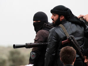Fighters from Al-Nusra Front, the Al Qaeda affiliate in Syria (AFP/Guillaume Briquet)