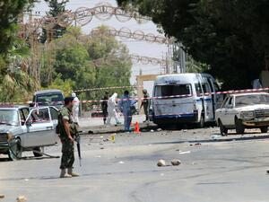 Lebanese security forces marked off the site of Monday morning's suicide bombings in al-Qaa, less than 24 hours before three more suicide bombings hit the town. (AFP/Stringer) Lebanese security forces marked off the site of Monday morning's suicide bombings in al-Qaa, less than 24 hours before three more suicide bombings hit the town. (AFP/Stringer)
