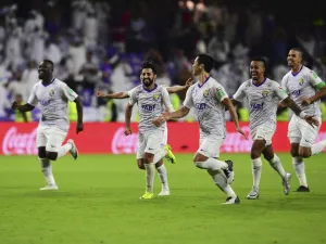 Al-Ain's players celebrate their win during the opening match of the FIFA Club World Cup 2018 football tournament between UAE's Al-Ain and New Zealand's Team Wellington at the Hazza Bin Zayed Stadium in Abu Dhabi, the capital of the United Arab Emirates, on December 12, 2018. Al-Ain defeated Team Wellington 4-3 on penalties after they drew 3-3 after full time.
Giuseppe CACACE / AFP