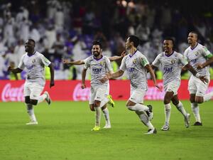 Al-Ain's players celebrate their win during the opening match of the FIFA Club World Cup 2018 football tournament between UAE's Al-Ain and New Zealand's Team Wellington at the Hazza Bin Zayed Stadium in Abu Dhabi, the capital of the United Arab Emirates, on December 12, 2018. Al-Ain defeated Team Wellington 4-3 on penalties after they drew 3-3 after full time.
Giuseppe CACACE / AFP