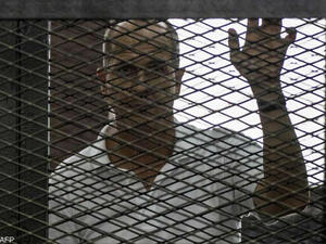 Egypt will retry Al Jazeera journalists Feb. 12 for charges of abetting terrorists and broadcasting false news. (AFP/File) 