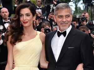Amal said her marriage to film star George, 55, causes 'extra publicity.' (Design & Trend)