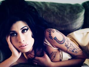 Winehouse died from alcohol poisoning in 2011 at the age of 27. (pcwallart.com)