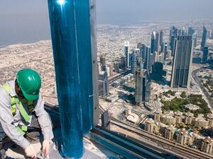 A construction employee working atop a skyscraper in Dubai. (File photo)