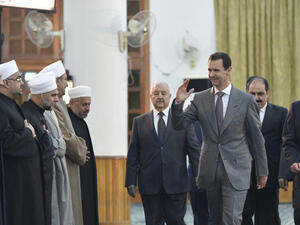 الأسد يشارك في احتفال المولد النبوي في دمشق