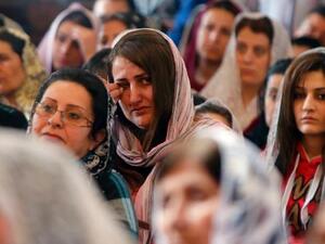 Assyrian Christian women attend church in Jdeideh, Lebanon on March 8, 2015 after fleeing bloodshed in neighboring Syria.  (AFP/File)