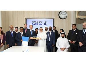 Noor Bank Team with Abdulqader Obaid Ali Chairman of UAE IAA.