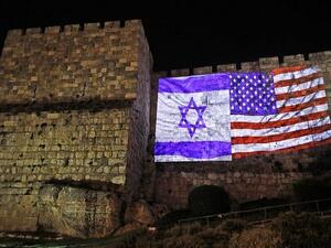 A giant US flag screened alongside Israel's national flag (AFP/File Photo)