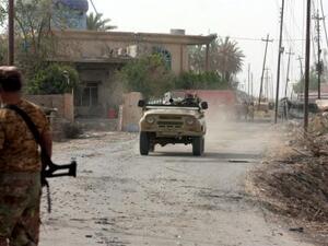 مركبة عسكرية في بيجي شمالي بغداد
