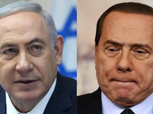 Prime Minister Benjamin Netanyahu (right) and former Italian President Silvio Berlusconi. (AFP/File)
