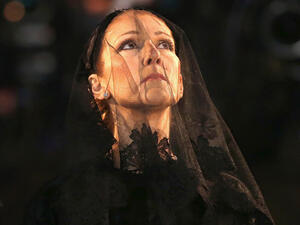 Celine Dion at her husband's funeral. (AFP)