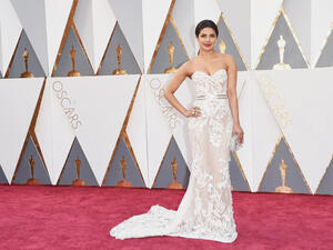 Chopra made her Oscar debut, stunning the 88th Academy Awards red carpet in a white Zuhair Murad strapless gown. (Popsugar.com.au)
