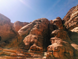 The massive cliffs at Petra are still hiding undiscovered monuments. (Albawaba) The massive cliffs at Petra are still hiding undiscovered monuments. (Albawaba)