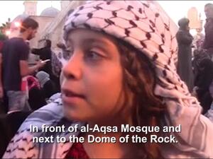 جنى جهاد تفتخر بأنها رغم صغر سنّها تغطي انتفاضة شعبها ـ يوتيوب