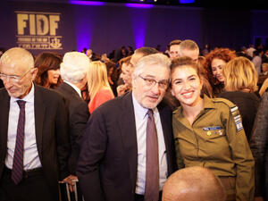 Robert De Niro and an Israeli soldier. (Photo Credit: Justin Kenderes)