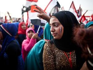 Women at a rally in Tahrir Square mark the anniversary of the Arab Spring (AFP/file)