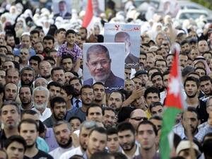 About 9.5 million Egyptians live outside the country, with 6.2 million expats living in Arab countries. (Khalil Mazraawi/ AFP)