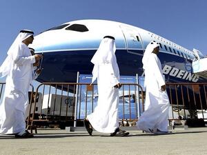 Emirati men visit the Dubai Airshow at its venue in Dubai. (AFP)