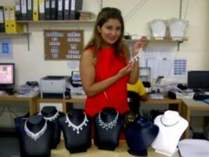 Shatha displaying necklaces