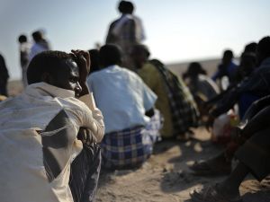 African migrants, including Ethiopians, wait near Obok, north of Djibouti's capital, for smugglers' boats to cross the Gulf of Aden into Yemen. (AFP/Tony Karumba)