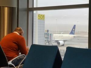An expat waits for his flight at the King Khalid International airport on February 16, 2017. (Fayez Nureldine/ AFP)