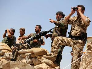 Kurdish peshmerga forces take position near Mosul in Iraq, August 15, 2014. (AFP/File)