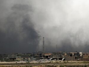 Smoke rises after a US-led coalition airstrike in southern Fallujah. (AFP/Ahmad Al-Rubaye) Smoke rises after a US-led coalition airstrike in southern Fallujah. (AFP/Ahmad Al-Rubaye)
