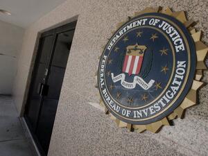 The FBI must work to improve its intelligence capabilities and information sharing to counter continuing threats, a report said Wednesday. (AFP/File)