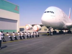A team from the Dubai Police landed a world record by pulling the superjumbo Emirates A380 plane for around 100 meters (Youtube Screengrab)