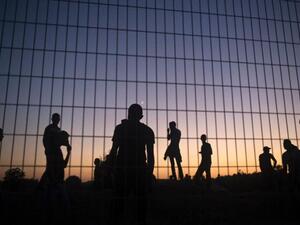 Israeli soldiers and Palestinian protestors clash at the border fence between Israel and the Gaza Strip on October 15, 2015.  (AFP/Mohammed Abed)