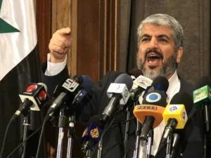 مشعل  تباحث مع كل من نائب الرئيس السوري فاروق الشرع ووزير الخارجية وليد المعلم حول وضع حماس وعلاقتها وإقامتها بدمشق 