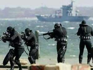 عناصر من “الكوماندوز البحري”، التابعة لكتائب القسام، الجناح المسلح لحركة “حماس″